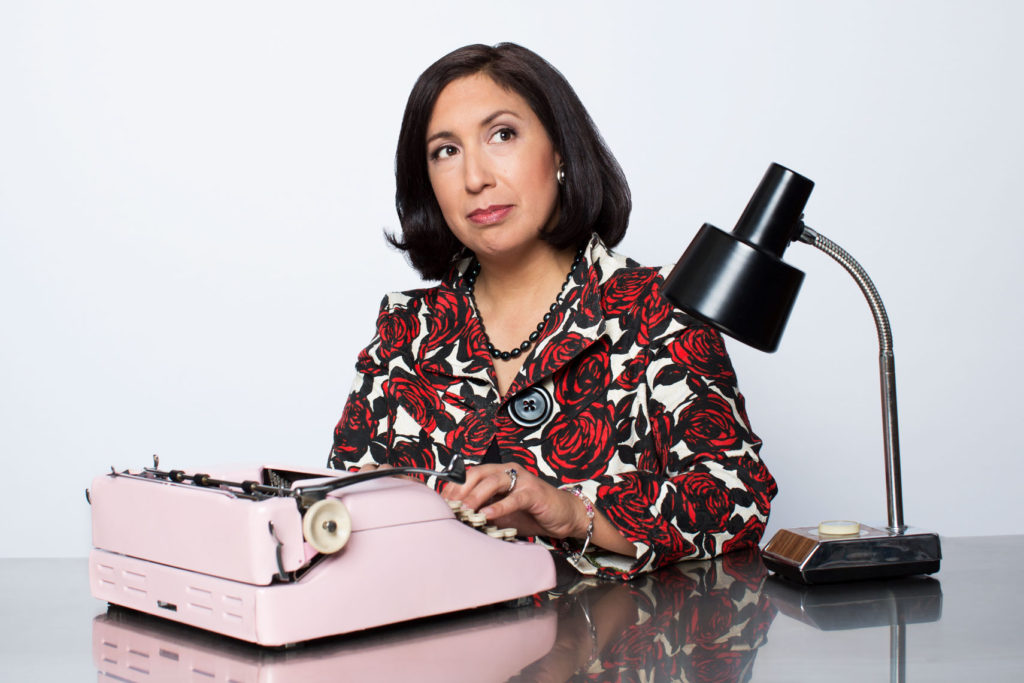 Portrait of Author at work at her typewriter