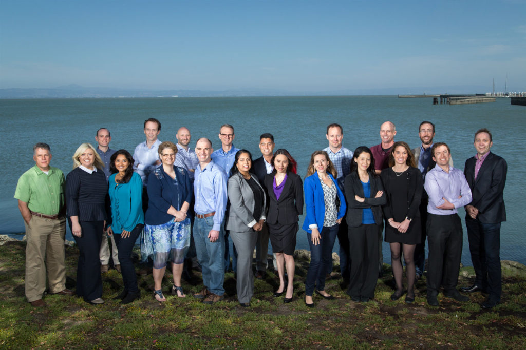 Group Photo of Tech Company by a Bay