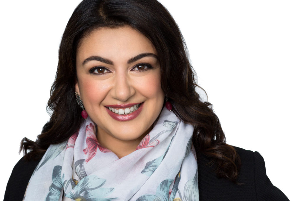 Headshot of Woman CEO with scarf